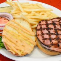 Cubano · Grilled ham, Swiss cheese and flip sauce.