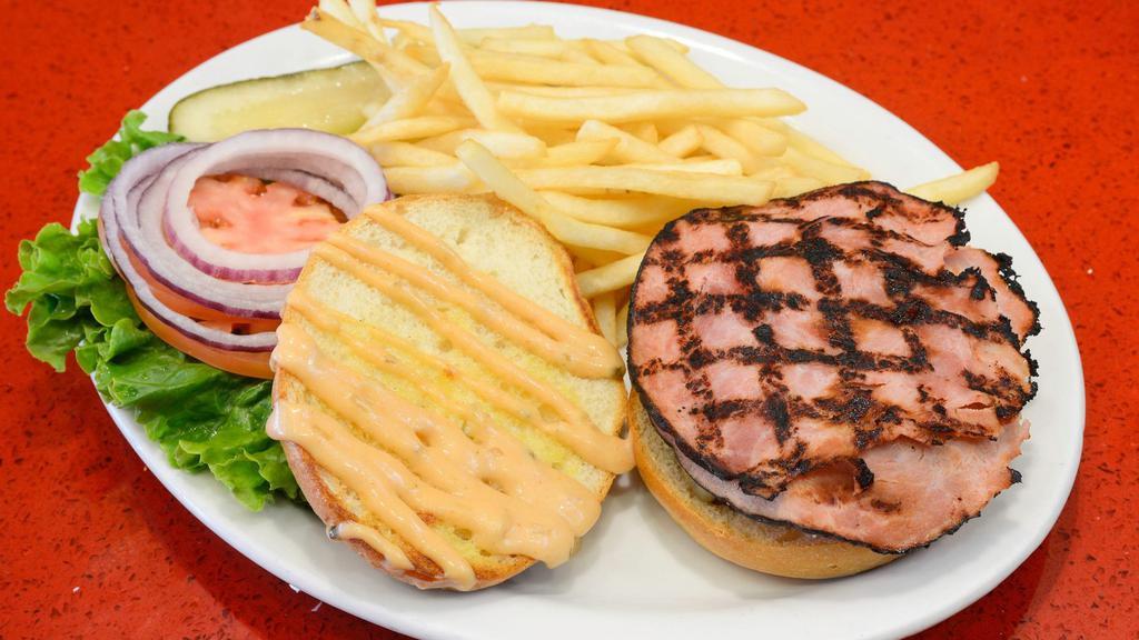 Cubano · Grilled ham, Swiss cheese and flip sauce.