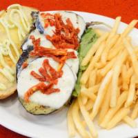 Grilled Eggplant · Baby greens, pesto mayo, sun-dried tomato & mozzarella cheese on a toasted roll.