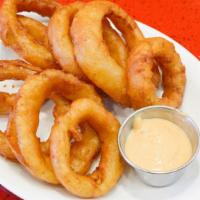 Beer Battered Onion Rings · Hot and crispy beer battered onion rings.