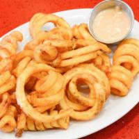 Curly Fries · Hot and crispy curly fries.
