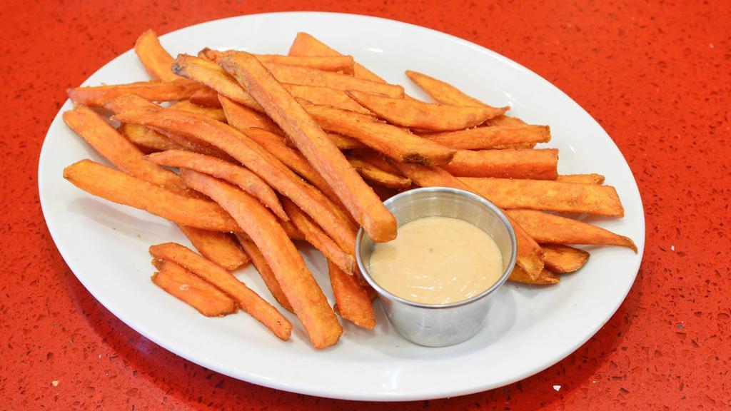 Sweet Potato Fries · Hot and crispy fries made with delicious sweet potatoes.