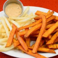 50/50 · 1/2 sweet potato fries & 1/2 regular fries, both delicious, hot, and cripsy.