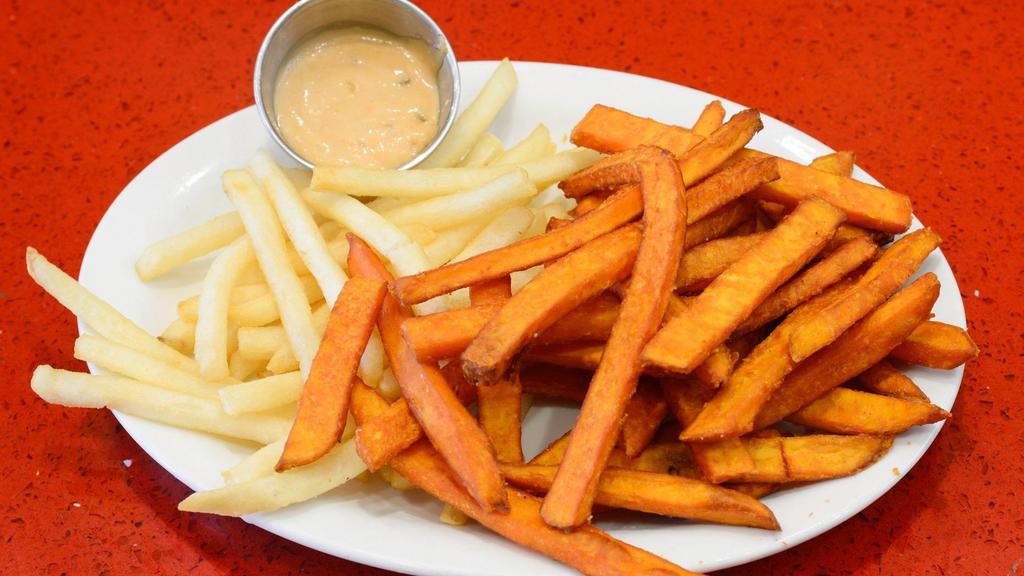 50/50 · 1/2 sweet potato fries & 1/2 regular fries, both delicious, hot, and cripsy.