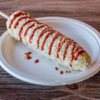 Corn on the Cob · Choice of Mayonnaise or Sour Cream, Cotija Cheese, and hot sauce  
Can also be dipped in Tak...