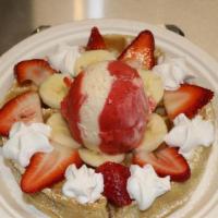 Fresh Fruit waffle with Ice Cream · Homemade waffle with fresh strawberries and bananas, whipped cream, and strawberries & cream...
