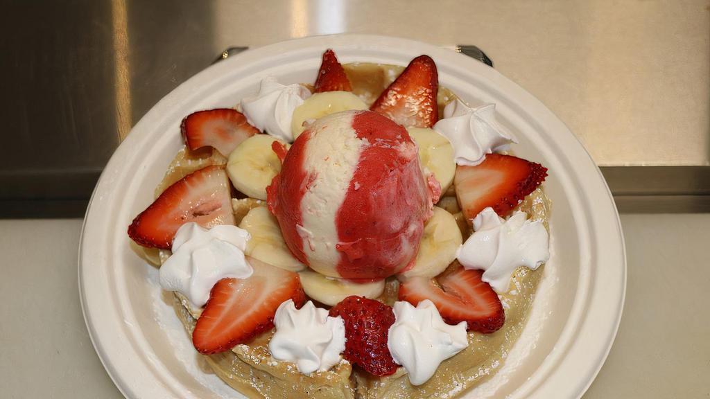 Fresh Fruit waffle with Ice Cream · Homemade waffle with fresh strawberries and bananas, whipped cream, and strawberries & cream Ice Cream