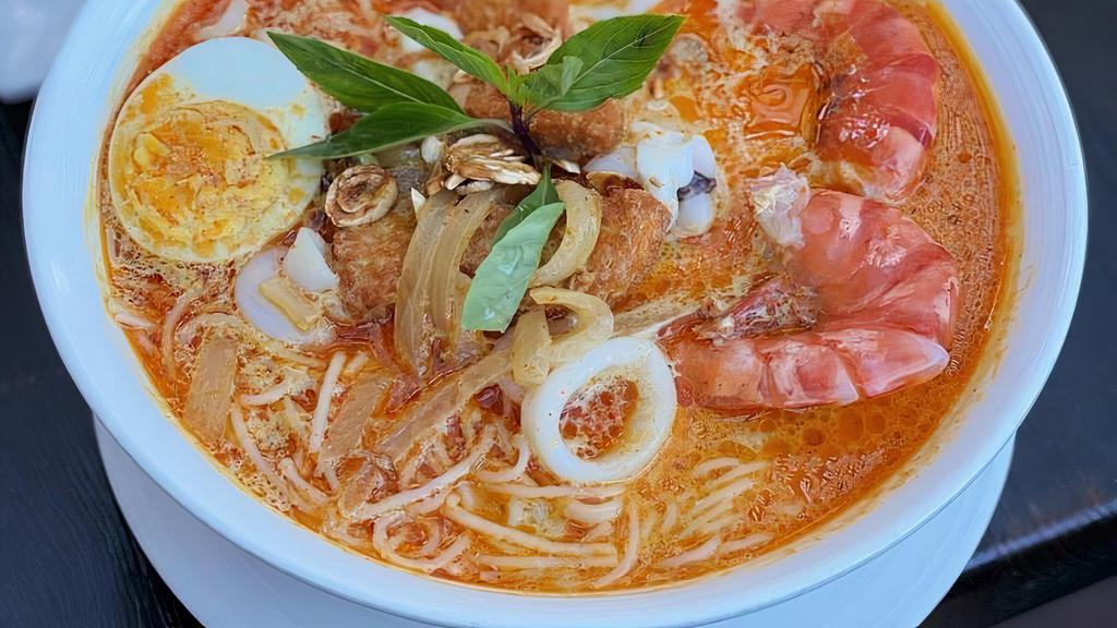 Laksa Noodles · Tiger prawn, calamari, egg, cucumber, bean sprout, basil, lemon, vermicelli.