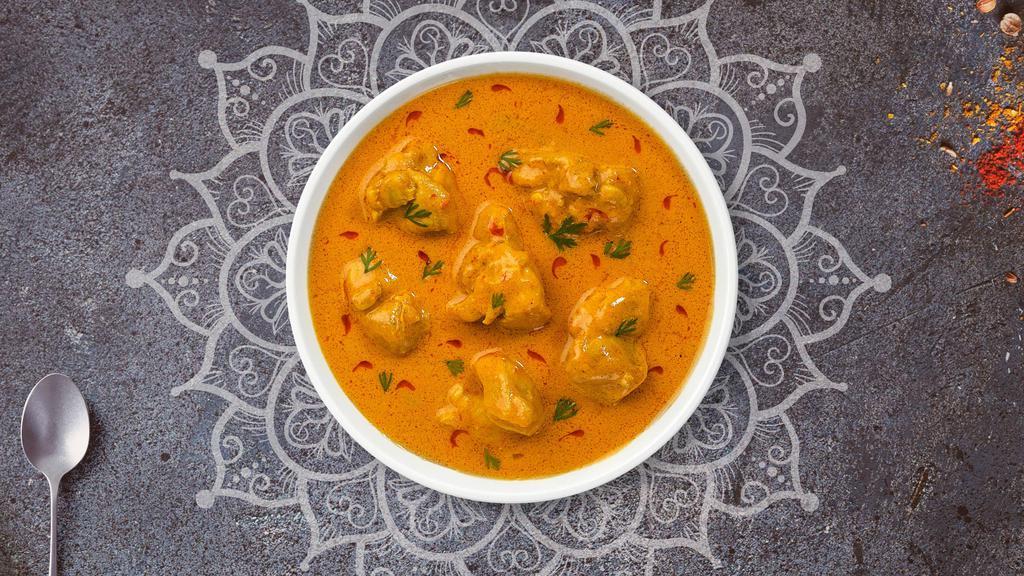 Chicken Korma · Free range chicken cooked in a rich, creamy tomato, and onion curry