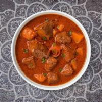 Lamb Tikka Masala · Juicy lamb cooked in a creamy tomato gravy and freshly ground spices