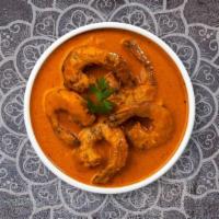 Shrimp Curry · Fresh shrimp cooked in a tomato based onion gravy with ground spices