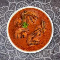 Prawn Vindaloo · Fresh prawn cooked in a spicy pungent curry with potatoes.
