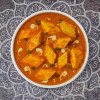 Kadhai Paneer · Tender cottage cheese pieces stir fried with bell peppers, onions, & tomatoes in a light gravy