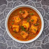Matar Paneer · Green peas cooked with cheese in creamy tomato sauce.