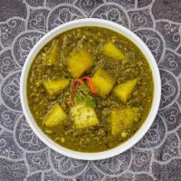 Aloo Palak · Fresh spinach cooked curry style with potatoes, cream and seasoned with aromatic herbs. Serv...