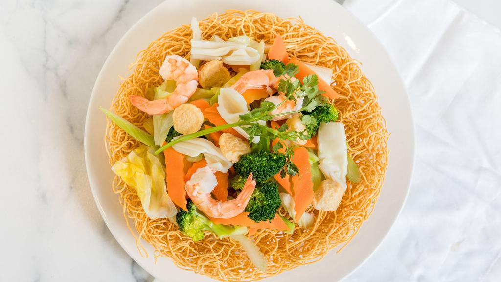 50. Crispy Egg Noodle - Mì Xào Dòn · Choice beef or chicken or seafood.