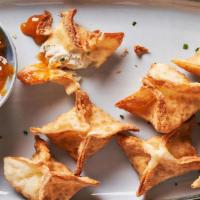 Crab Rangoon  · Crispy appetizers filled with crab meat
