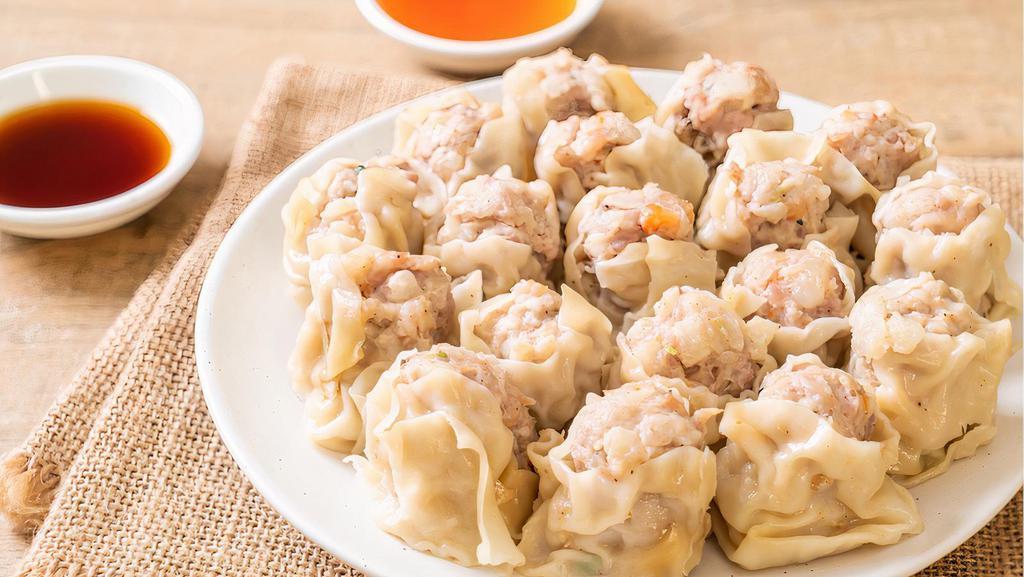 Dumpling (Pork/Beef) · Classic dumpling filles with a spiced beef or pork mix