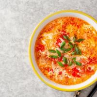 Tomato Egg Drop Soup · Broth prepared with tomatoes and eggs