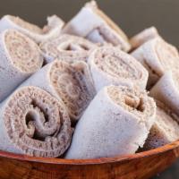 Extra Injera · Extra rolls of house-made injera.