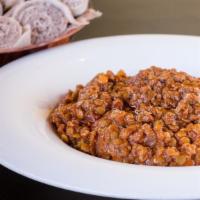 Ye Messer Wot · Vegan. Red lentils cooked slowly with organic ethiopian spices and herbs. Comes with your ch...