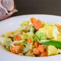 Ata-Kilt · Vegan. A flavorful dish of sautéed cabbage, carrots, potatoes, onions, garlic, ginger, and t...