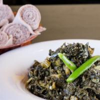 Gomen · Vegan. Fresh seasonal greens steamed cooked with onions, ginger and garlic. Comes with two p...