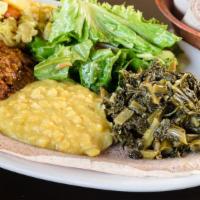 Ye Tsome Bayaynetu · Vegetarian sampler: messer wot, kik-alicha, ata-kilt and gomen. Comes with two pieces of inj...