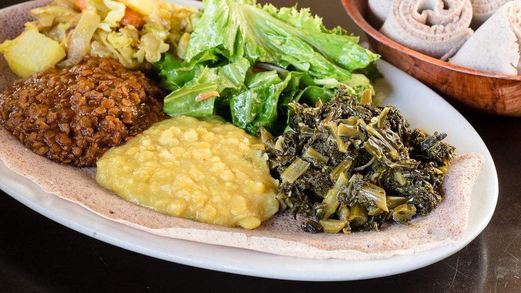 Ye Tsome Bayaynetu · Vegetarian sampler: messer wot, kik-alicha, ata-kilt and gomen. Comes with two pieces of injera.