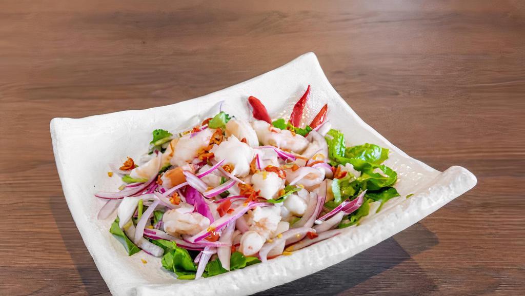 Traditional Shrimp Salad · Chopped steam shrimp tossed with fresh onions, cilantros, lemon, chopped red chili and garlic oil.