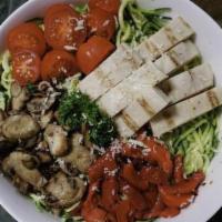 Pesto Zoodle Salad · 489 cal. Spiralized zucchini, basil pesto, grilled chicken breast, grape tomatoes, roasted r...