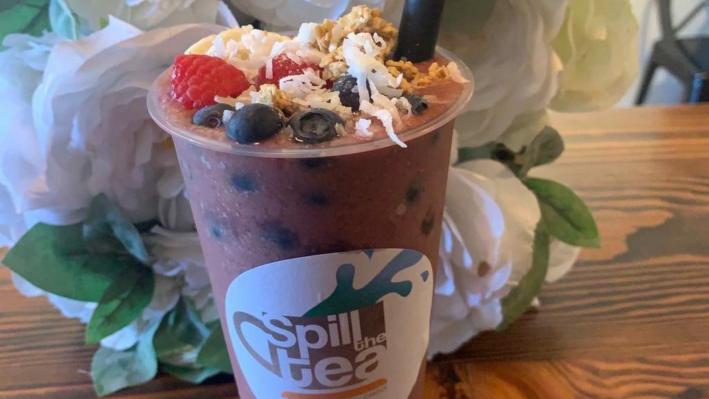 Acai Smoothie · Acai based smoothie infused with fresh banana and strawberry. Topped with granola, fresh fruit, and almonds