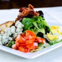 Cobb Salad · Chicken, Spring mix, diced bacon, hard boiled egg, blue cheese, tomato, and avocado and ranc...
