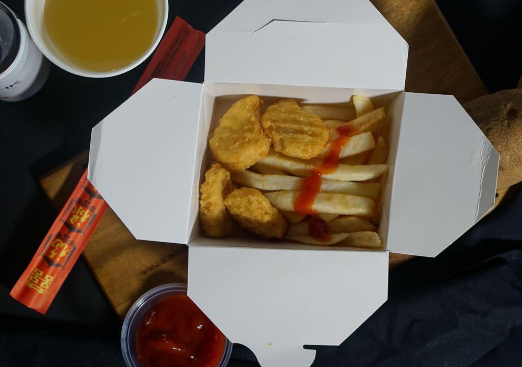 Kid's Happy Meal · Four piece nuggets and fries.
