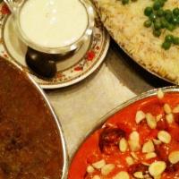 Vegetable Thali (For Two) · Includes: Papadum, Veg. Samosa, Raita, Saag Paneer, Dal Makhni, Nan, Rice, and Kheer