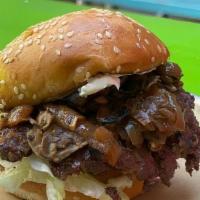 Truffle Burger · Caramelized onions, sautéed mushrooms, truffled cheese, lettuce, aioli