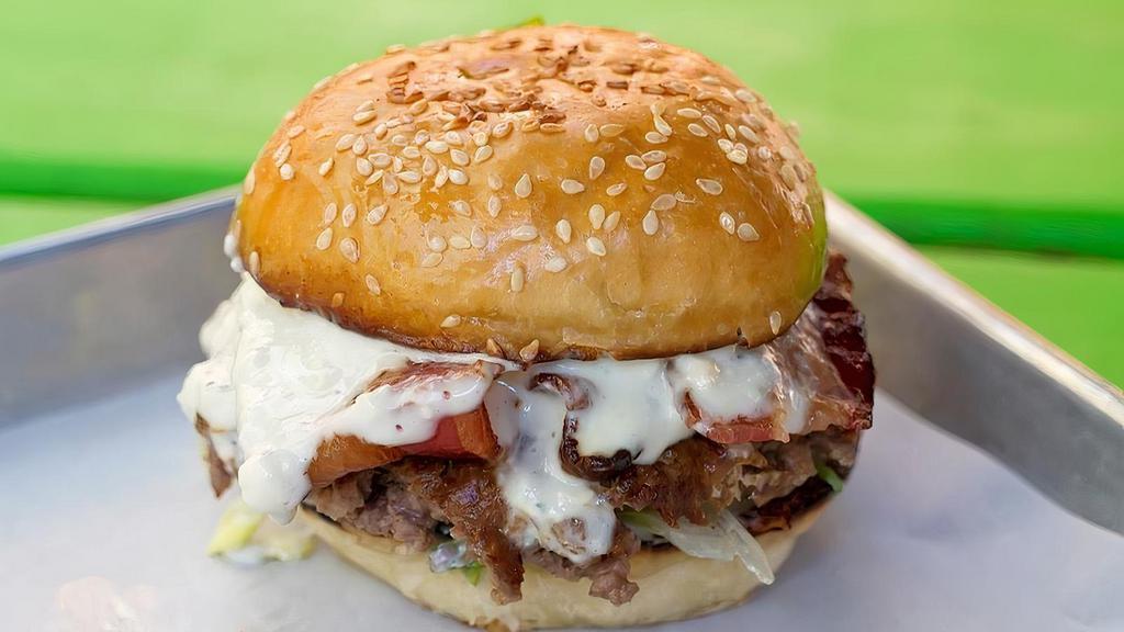 Bacon Blue Burger · Bacon, blue cheese dressing, lettuce, onions and mayo