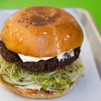 Veggie Burger · (Our Veggie Burger) Beet and quinoa patty, truffle cheese, sprouts, onion, pickle, aioli