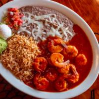 Camarones a la Diabla · Very spicy. Shrimp sauteed in a red chile sauce with a tang of orange. Served with rice, bea...