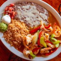Camarones Rancheros · Shrimp sauteed in butter, garlic, onions, bell peppers and ranchera sauce. Served with rice,...