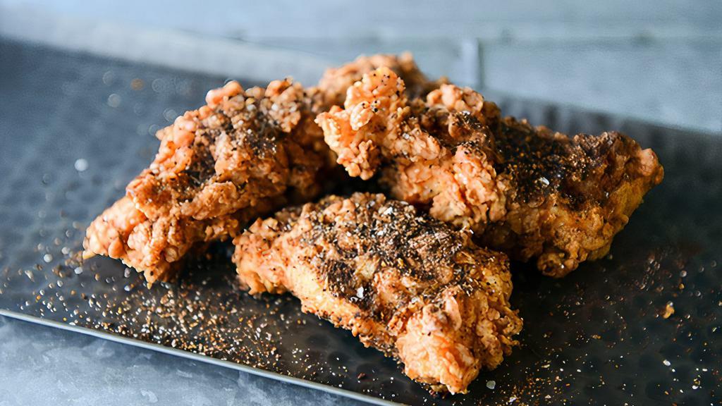 Coffee BBQ Chicken Strips · Hand battered Mary's organic chicken breast strips with our secret coffee BBQ dry rub with your choice of one complementary dipping sauce. Comes with three strips.