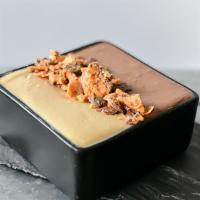 Butterscotch Pudding with Chocolate Ganache & Butterfinger Crumbles · Our delicious house made pudding with just enough chocolate and topped with tasty Butterfing...
