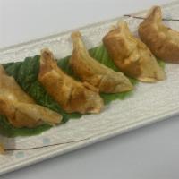 Gyoza · 6 pieces of pan fried potstickers.
