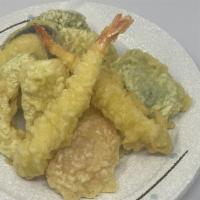 Tempura Appetizer · 2 pieces tempura shrimp and 6 pieces assorted vegetables.