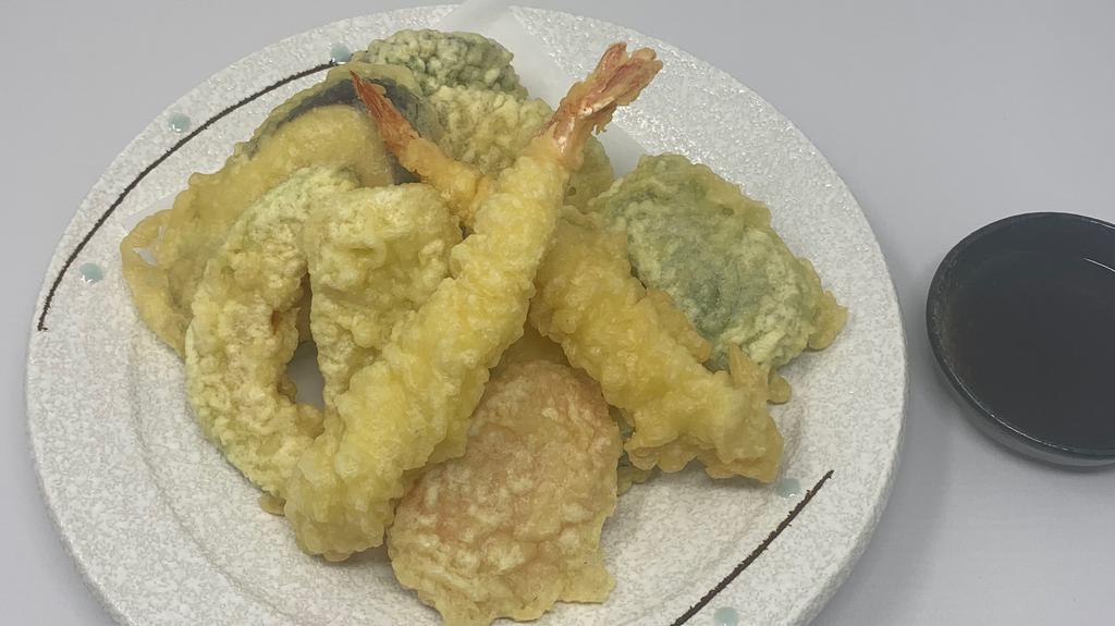 Tempura Appetizer · 2 pieces tempura shrimp and 6 pieces assorted vegetables.