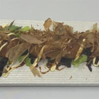Takoyaki · 6 pieces Japanese deep-fried octopus ball, Benito flakes, mayonnaise & unagi sauce.