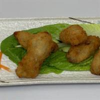 Fried Oysters · 6 pieces Japanese style fried oysters with goma dressing.