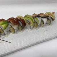 Dragon Roll · Shrimp tempura, crab meat, avocado, BBQ eel, and unagi sauce. Consuming raw undercooked meat...