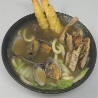 Nabeyaki Udon · 2 pieces Tempura Shrimp, Chicken, Fish Cake & Vegetables.