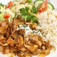 BBQ Lamb Over Rice · House special dish made with BBQ Lamb, served on a bed of rice. Includes a side salad contai...